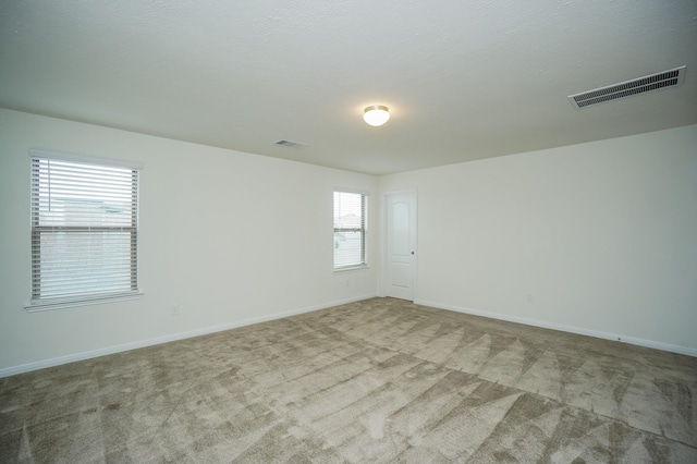 4615 Sabine Creek Way, Katy, TX 77449 - carpeted spare room with baseboards