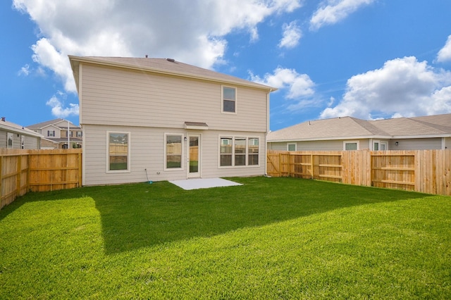 4615 Sabine Creek Way, Katy, TX 77449 - rear view of house with a fenced backyard and a patio