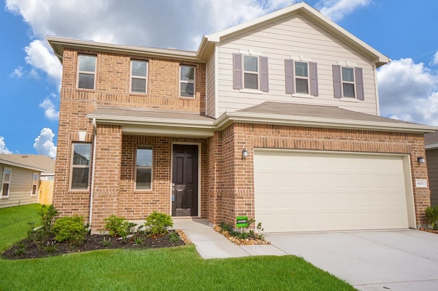 4615 Sabine Creek Way, Katy, TX 77449 - traditional home with brick siding, a garage, concrete driveway, and a front lawn