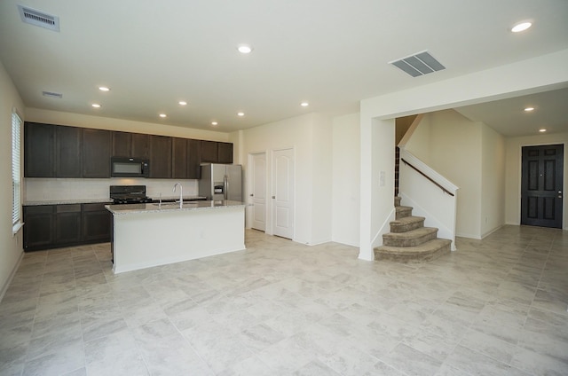 4615 Sabine Creek Way, Katy, TX 77449 - kitchen featuring black appliances, recessed lighting, a kitchen island with sink, open floor plan, and dark brown cabinetry