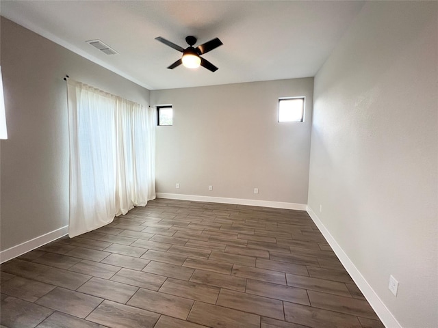 18518 Parkland Xing, Cypress, TX 77433 - unfurnished room with a ceiling fan and dark wood-style flooring