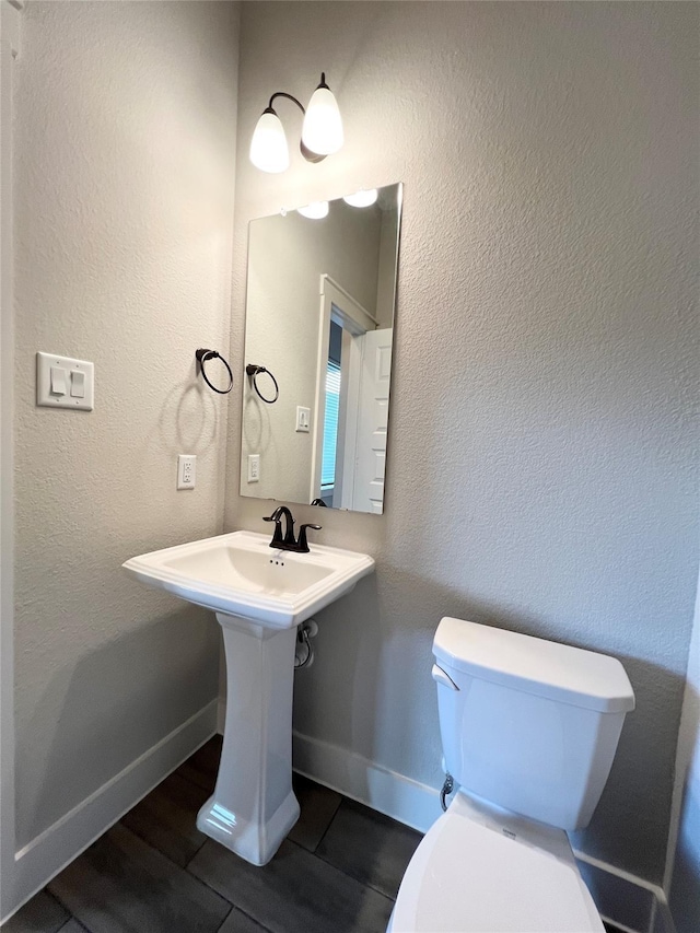 18518 Parkland Xing, Cypress, TX 77433 - bathroom featuring toilet and baseboards