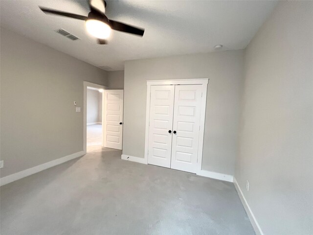 18518 Parkland Xing, Cypress, TX 77433 - unfurnished bedroom featuring a closet, ceiling fan, and carpet floors