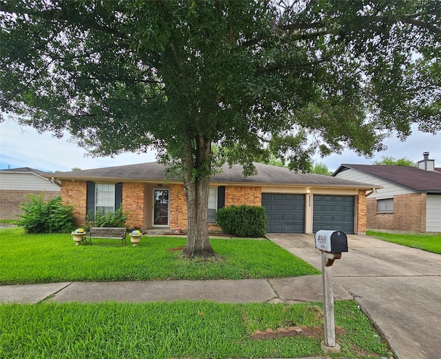 19423 Quiet Brook Dr, Houston, TX 77084 - ranch-style house with driveway, an attached garage, and a front yard