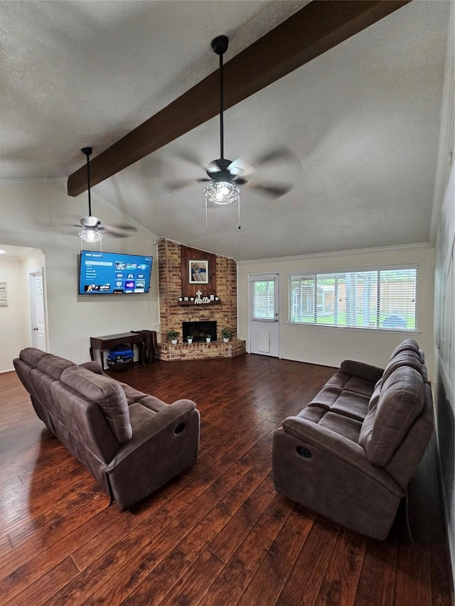 19423 Quiet Brook Dr, Houston, TX 77084 - living room featuring ceiling fan, hardwood / wood-style flooring, a fireplace, and a textured ceiling