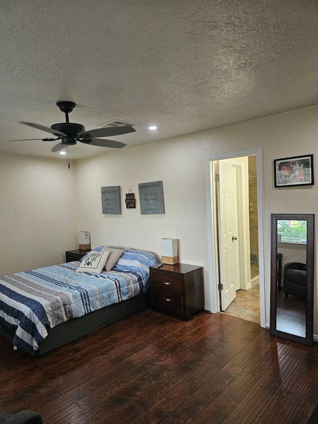 19423 Quiet Brook Dr, Houston, TX 77084 - bedroom with hardwood / wood-style floors, a textured ceiling, recessed lighting, and a ceiling fan