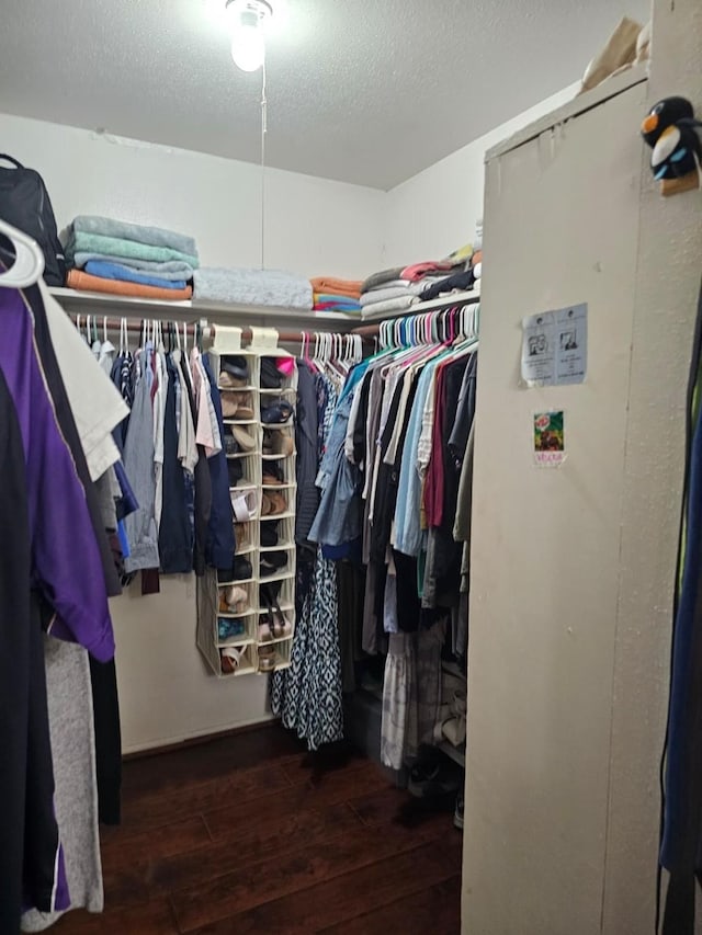 19423 Quiet Brook Dr, Houston, TX 77084 - spacious closet featuring wood-type flooring