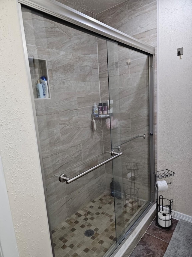 19423 Quiet Brook Dr, Houston, TX 77084 - full bathroom with a shower stall and tile patterned floors