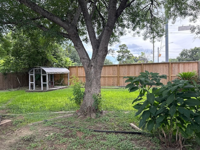 19423 Quiet Brook Dr, Houston, TX 77084 - fenced backyard with an outbuilding