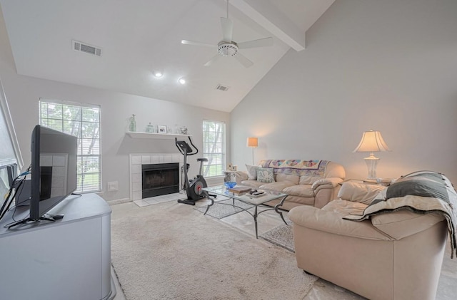 14334 Cypress Valley Dr, Cypress, TX 77429 - living area featuring beam ceiling, a fireplace, high vaulted ceiling, ceiling fan, and carpet flooring