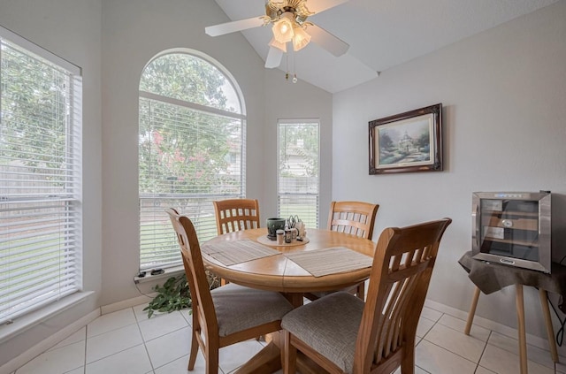 14334 Cypress Valley Dr, Cypress, TX 77429 - dining space with vaulted ceiling, plenty of natural light, light tile patterned flooring, and ceiling fan