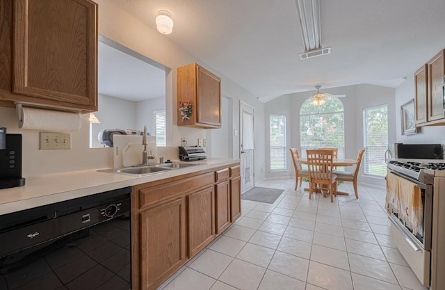 14334 Cypress Valley Dr, Cypress, TX 77429 - kitchen with dishwasher, white gas range, light countertops, and healthy amount of natural light