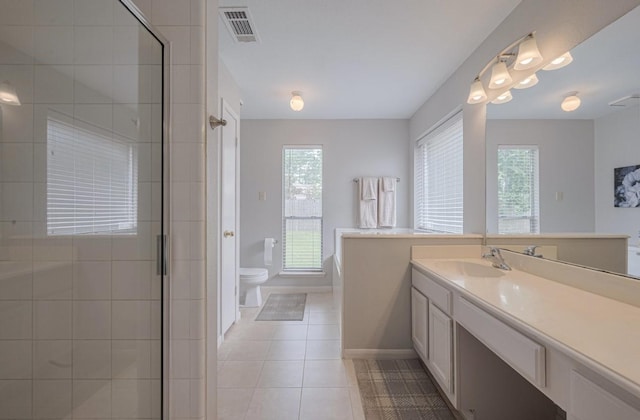14334 Cypress Valley Dr, Cypress, TX 77429 - full bathroom with plenty of natural light, vanity, tile patterned floors, and tiled shower