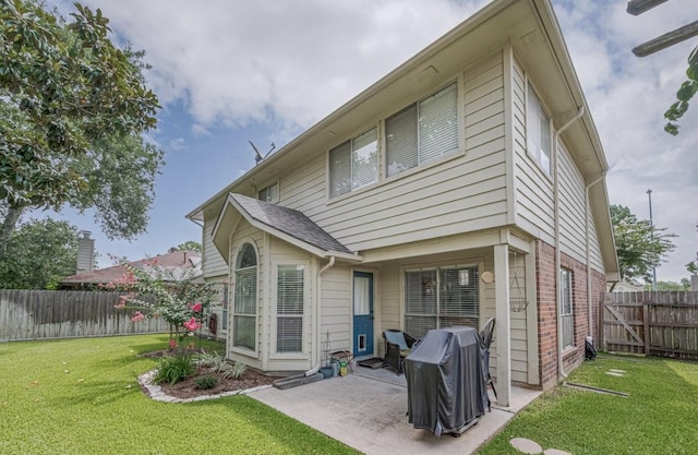 14334 Cypress Valley Dr, Cypress, TX 77429 - back of house featuring a patio area, a fenced backyard, and brick siding