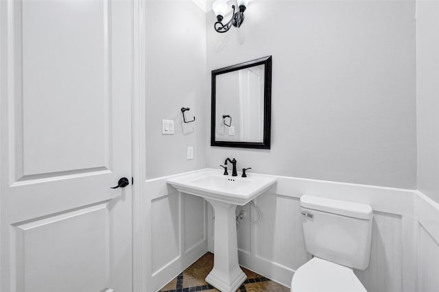 194 W Breezy Way, The Woodlands, TX 77380 - half bathroom featuring toilet and wood finished floors