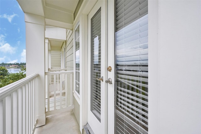 194 W Breezy Way, The Woodlands, TX 77380 - balcony with a water view and french doors