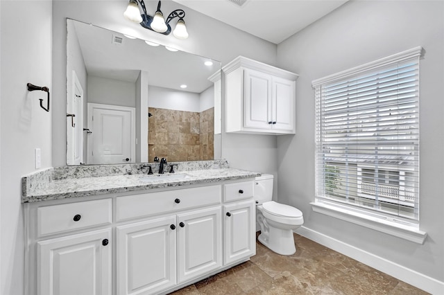 194 W Breezy Way, The Woodlands, TX 77380 - full bath featuring a tile shower, vanity, and plenty of natural light