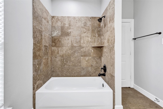 194 W Breezy Way, The Woodlands, TX 77380 - bathroom with shower / bathtub combination and baseboards