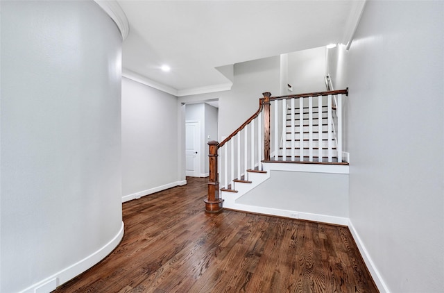 194 W Breezy Way, The Woodlands, TX 77380 - staircase with ornamental molding and wood finished floors