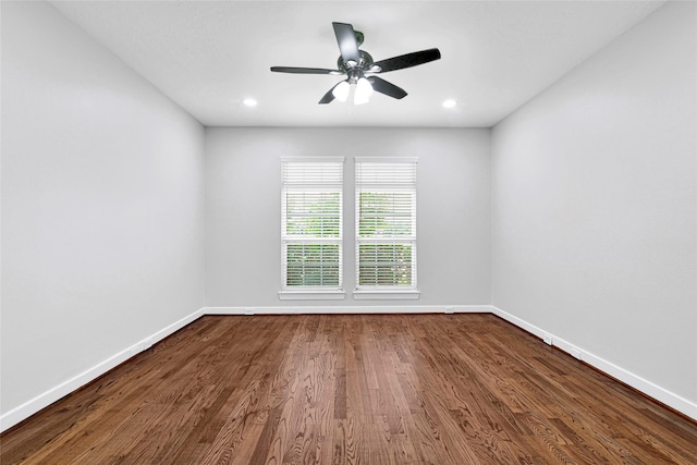 194 W Breezy Way, The Woodlands, TX 77380 - unfurnished room with dark wood-style floors, a ceiling fan, and recessed lighting