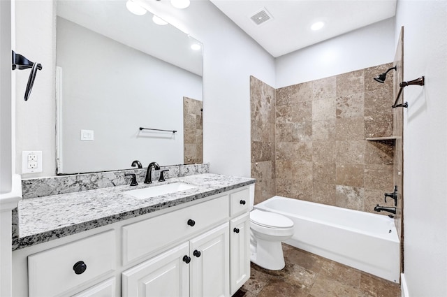 194 W Breezy Way, The Woodlands, TX 77380 - full bathroom featuring vanity, washtub / shower combination, and stone finish floors