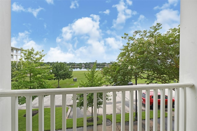 194 W Breezy Way, The Woodlands, TX 77380 - balcony featuring a water view