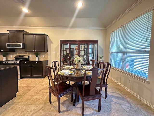 6818 Pear Point Ln, Richmond, TX 77469 - dining area with ornamental molding and baseboards