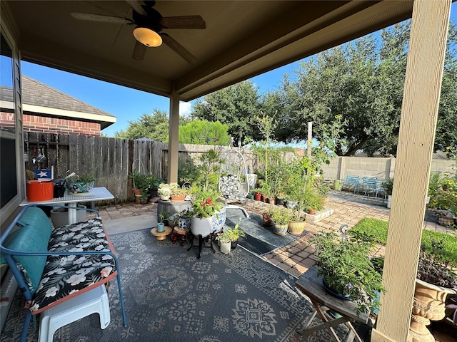 6818 Pear Point Ln, Richmond, TX 77469 - fenced backyard featuring a patio and ceiling fan