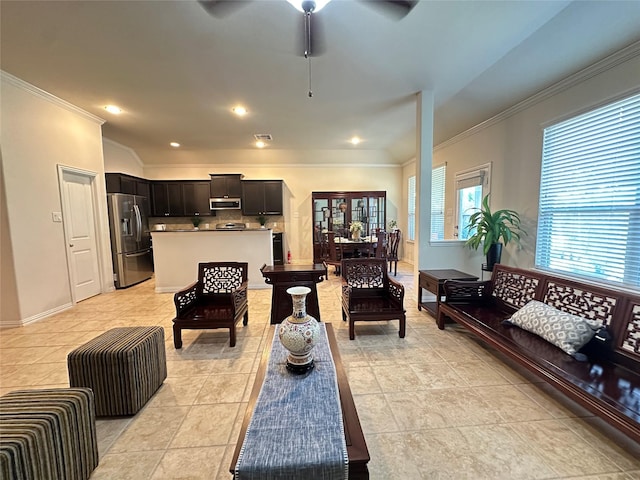 6818 Pear Point Ln, Richmond, TX 77469 - living room featuring ornamental molding, ceiling fan, and light tile patterned floors