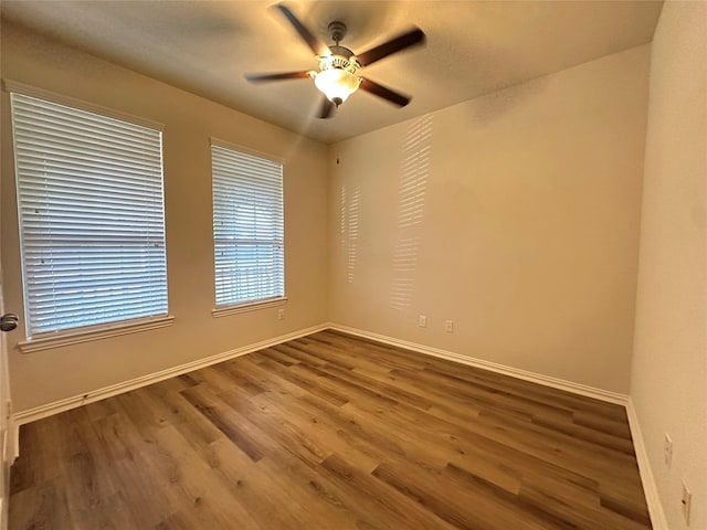 6818 Pear Point Ln, Richmond, TX 77469 - empty room featuring wood finished floors and a ceiling fan