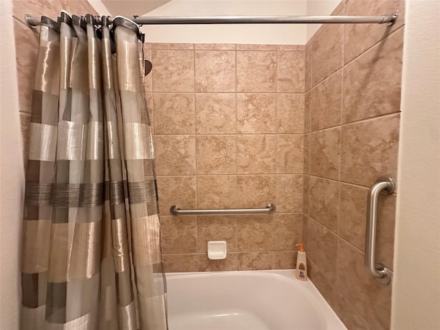 6818 Pear Point Ln, Richmond, TX 77469 - bathroom featuring shower / bathtub combination with curtain