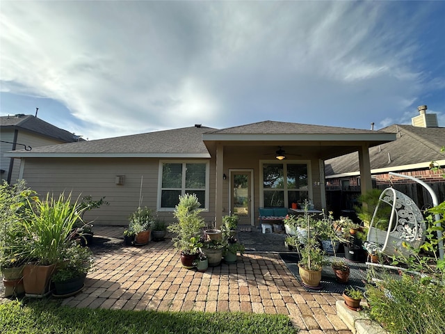 6818 Pear Point Ln, Richmond, TX 77469 - rear view of property with a patio area, ceiling fan, a shingled roof, and outdoor lounge area