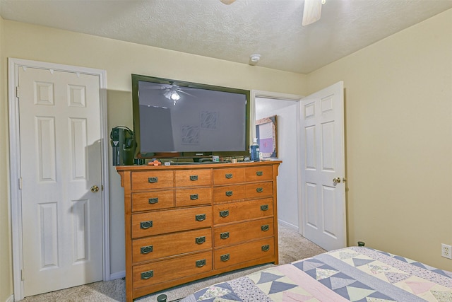 7806 Burgess Rd, Hitchcock, TX 77563 - bedroom featuring light carpet and a ceiling fan