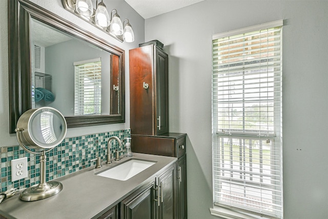 7806 Burgess Rd, Hitchcock, TX 77563 - bathroom featuring backsplash and vanity