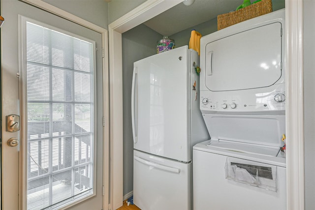 7806 Burgess Rd, Hitchcock, TX 77563 - washroom featuring stacked washer / drying machine