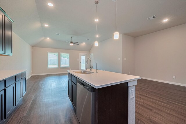 21830 Hickory Springs Ct, New Caney, TX 77357 - kitchen with open floor plan, dark wood-style floors, stainless steel dishwasher, recessed lighting, and light countertops