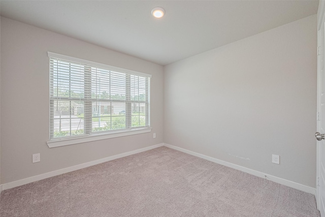 21830 Hickory Springs Ct, New Caney, TX 77357 - empty room with carpet and baseboards