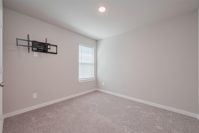 21830 Hickory Springs Ct, New Caney, TX 77357 - carpeted spare room featuring baseboards