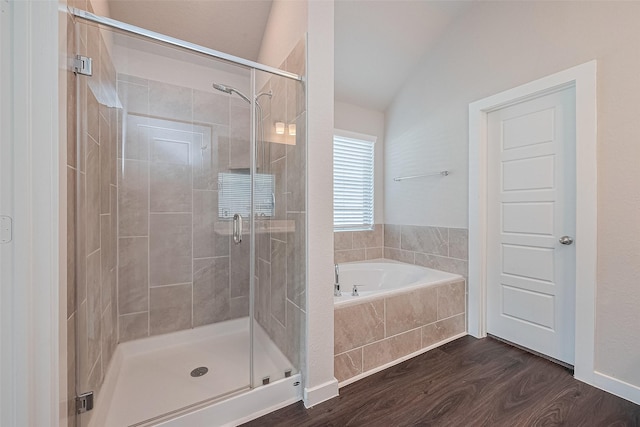 21830 Hickory Springs Ct, New Caney, TX 77357 - bathroom with a garden tub, lofted ceiling, wood finished floors, and a shower stall