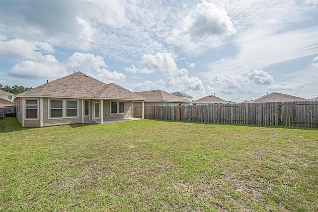 21830 Hickory Springs Ct, New Caney, TX 77357 - fenced backyard with a patio