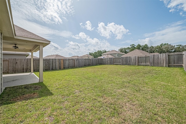 21830 Hickory Springs Ct, New Caney, TX 77357 - fenced backyard with a patio and a ceiling fan
