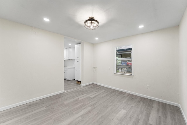 4715 Engleford St, Houston, TX 77026 - spare room with light wood-style floors and recessed lighting