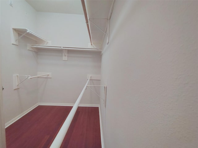 3511 Glenhill Dr, Pearland, TX 77584 - walk in closet featuring wood finished floors