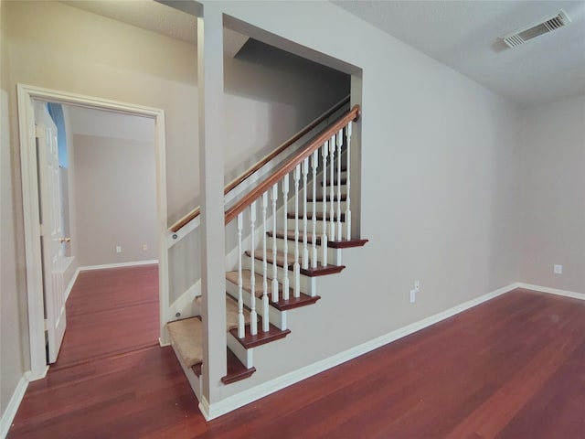 3511 Glenhill Dr, Pearland, TX 77584 - stairway featuring wood finished floors and baseboards