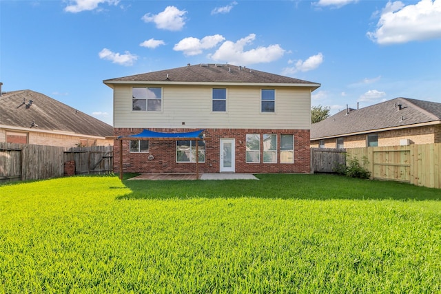 3502 Avalon Spring Ln, Spring, TX 77386 - rear view of house featuring brick siding, a fenced backyard, and a patio