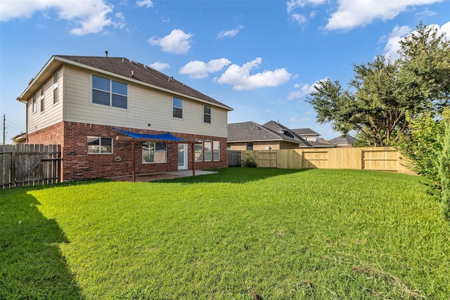 3502 Avalon Spring Ln, Spring, TX 77386 - rear view of property with brick siding, a fenced backyard, and a patio