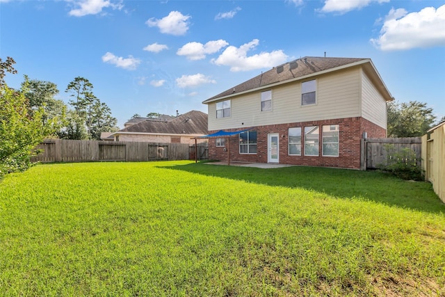 3502 Avalon Spring Ln, Spring, TX 77386 - back of property with brick siding, a fenced backyard, and a patio area