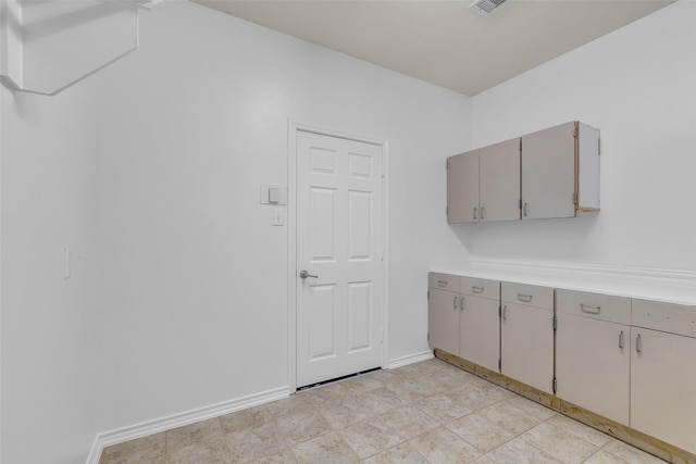 3502 Avalon Spring Ln, Spring, TX 77386 - kitchen with gray cabinets and light countertops