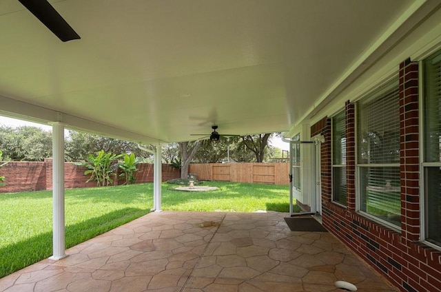 1123 Woodley Bnd, Sugar Land, TX 77479 - fenced backyard with a patio and a ceiling fan