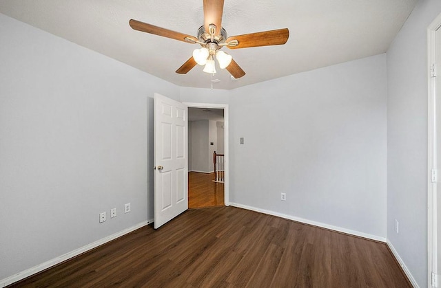 1123 Woodley Bnd, Sugar Land, TX 77479 - empty room with wood finished floors and ceiling fan